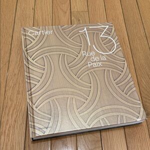Cartier Hardcover Book in Champagne Beige with Embossed Circular Pattern